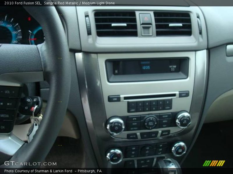 Sangria Red Metallic / Medium Light Stone 2010 Ford Fusion SEL