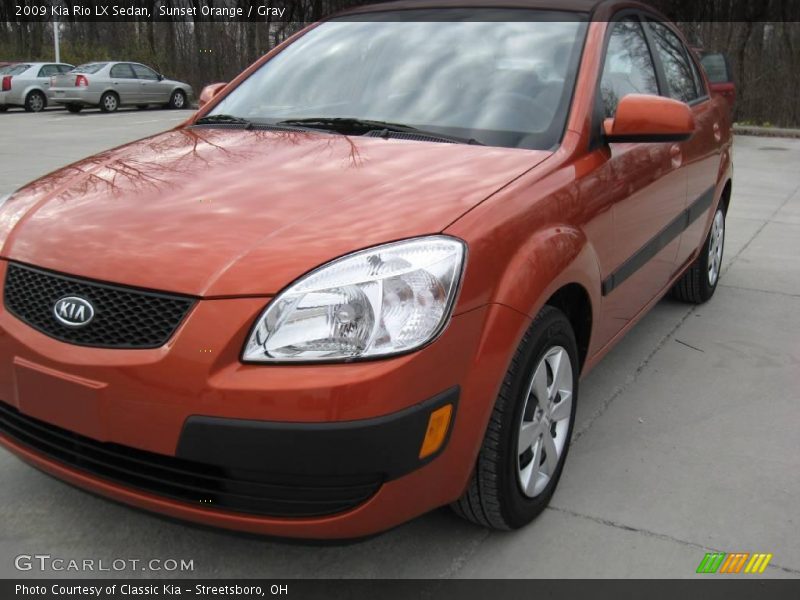 Sunset Orange / Gray 2009 Kia Rio LX Sedan