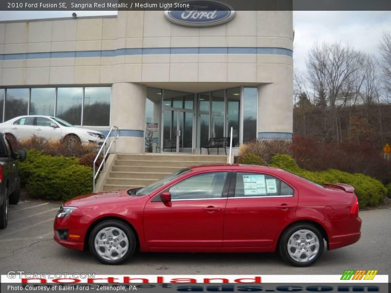 Sangria Red Metallic / Medium Light Stone 2010 Ford Fusion SE