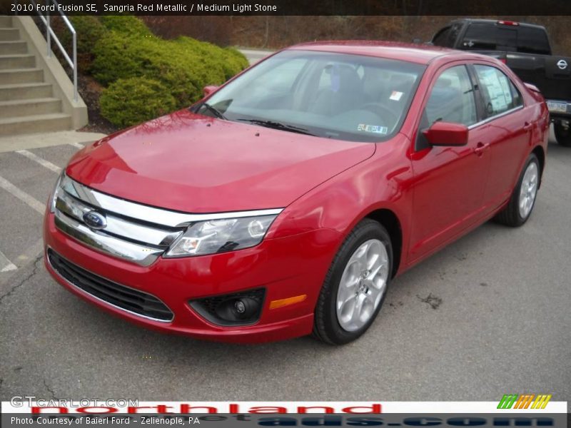 Sangria Red Metallic / Medium Light Stone 2010 Ford Fusion SE