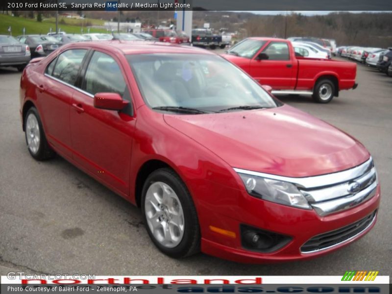 Sangria Red Metallic / Medium Light Stone 2010 Ford Fusion SE