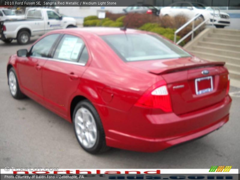 Sangria Red Metallic / Medium Light Stone 2010 Ford Fusion SE