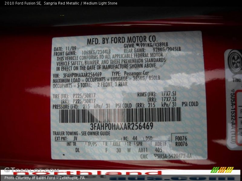 Sangria Red Metallic / Medium Light Stone 2010 Ford Fusion SE