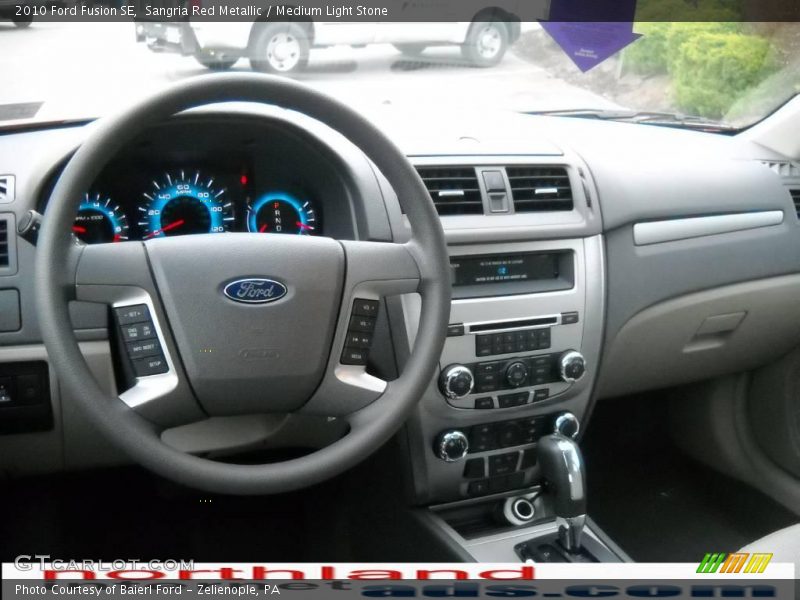 Sangria Red Metallic / Medium Light Stone 2010 Ford Fusion SE