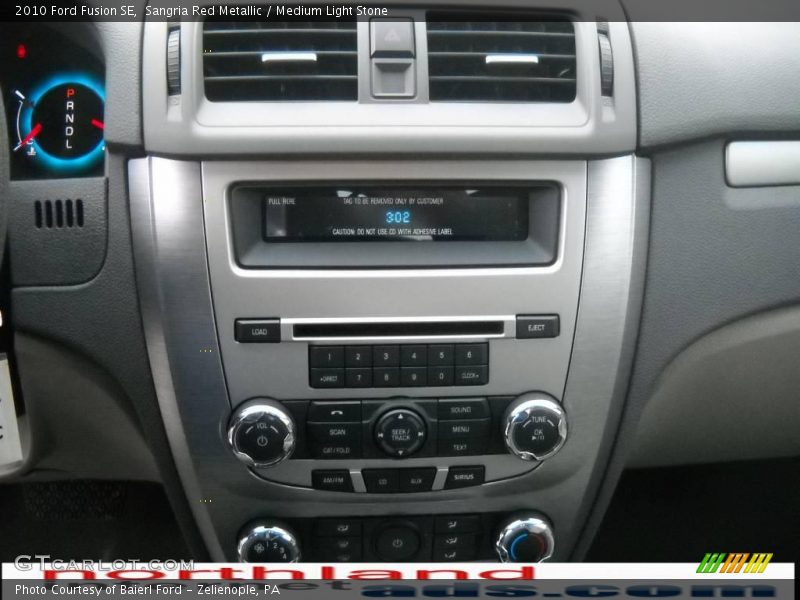 Sangria Red Metallic / Medium Light Stone 2010 Ford Fusion SE