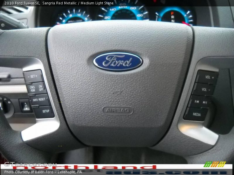 Sangria Red Metallic / Medium Light Stone 2010 Ford Fusion SE