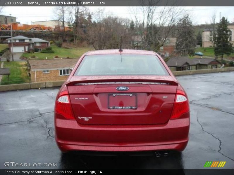 Sangria Red Metallic / Charcoal Black 2010 Ford Fusion SE