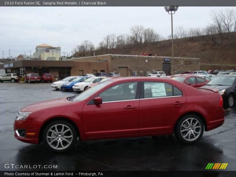 Sangria Red Metallic / Charcoal Black 2010 Ford Fusion SE