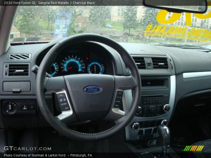 Sangria Red Metallic / Charcoal Black 2010 Ford Fusion SE