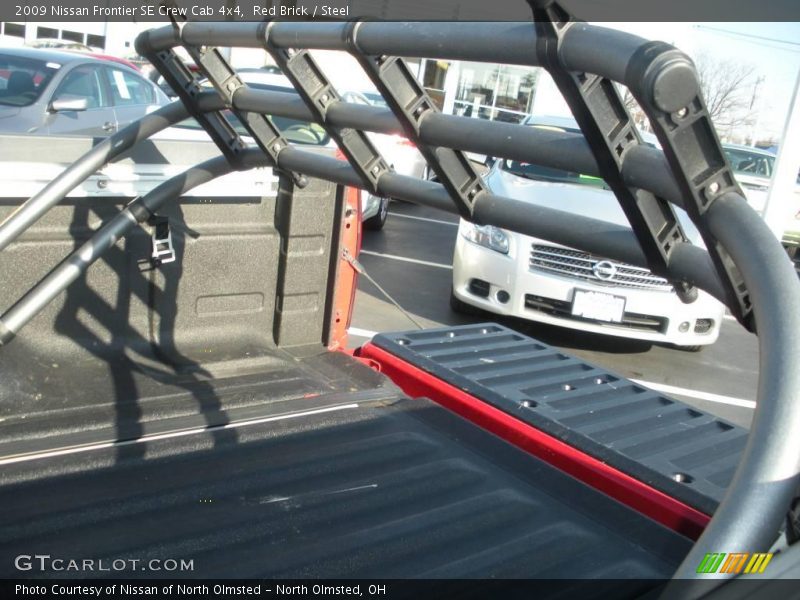 Red Brick / Steel 2009 Nissan Frontier SE Crew Cab 4x4