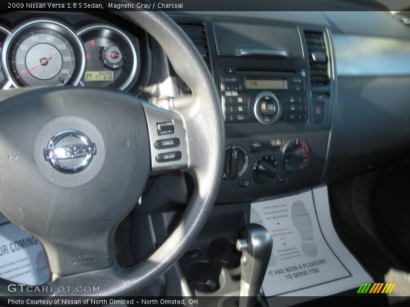 Magnetic Gray / Charcoal 2009 Nissan Versa 1.8 S Sedan