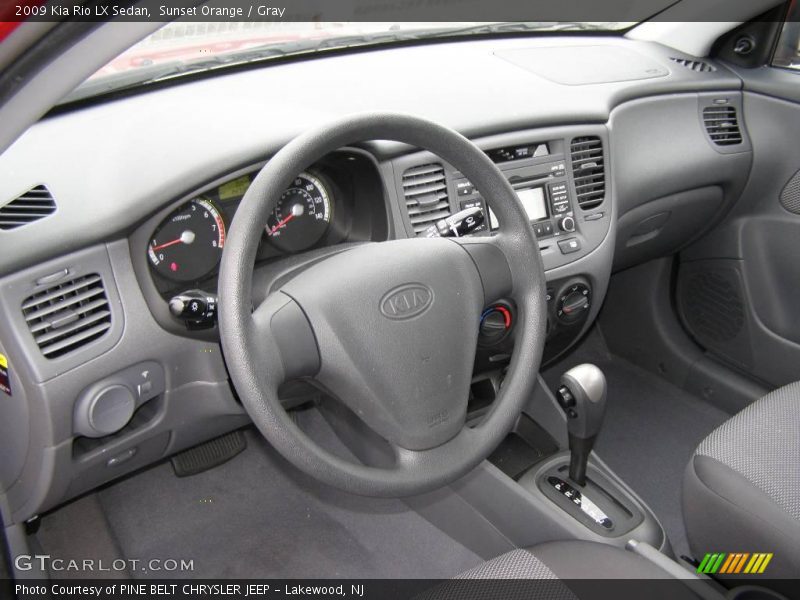 Sunset Orange / Gray 2009 Kia Rio LX Sedan