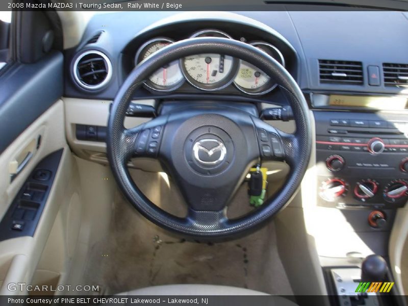 Rally White / Beige 2008 Mazda MAZDA3 i Touring Sedan