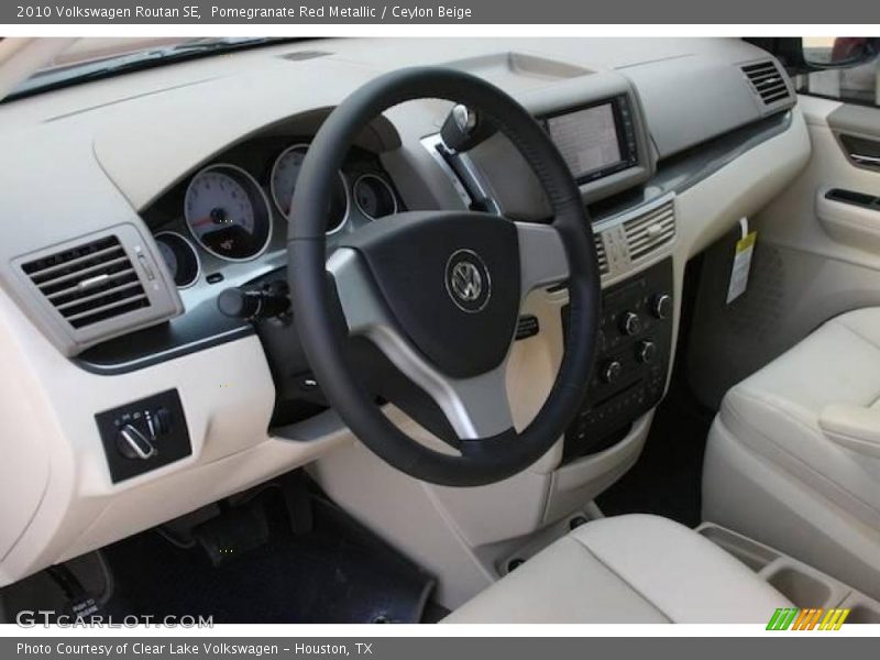 Pomegranate Red Metallic / Ceylon Beige 2010 Volkswagen Routan SE