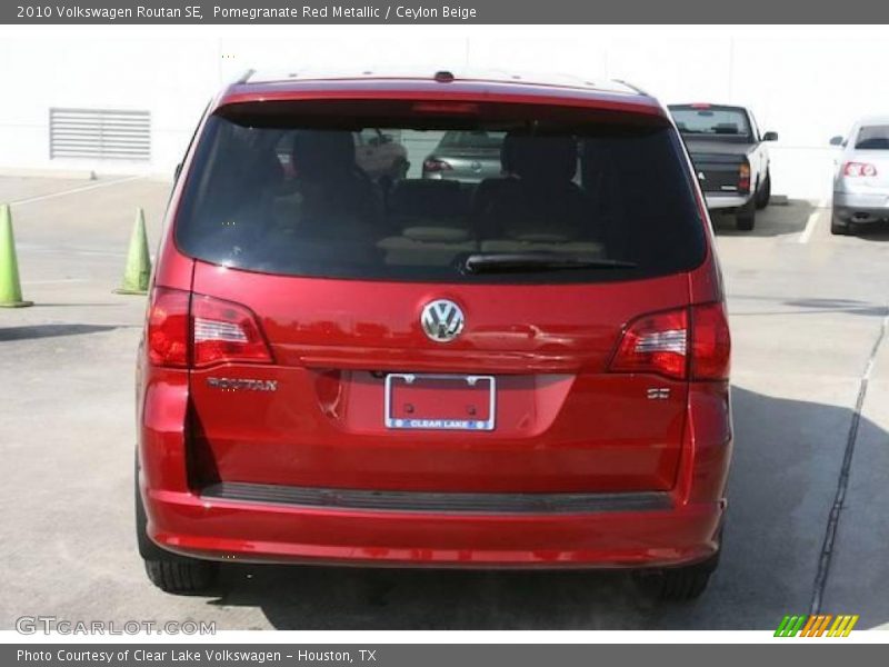 Pomegranate Red Metallic / Ceylon Beige 2010 Volkswagen Routan SE