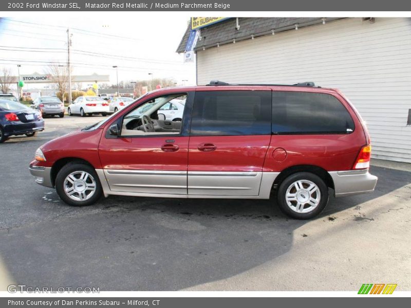 Matador Red Metallic / Medium Parchment Beige 2002 Ford Windstar SEL