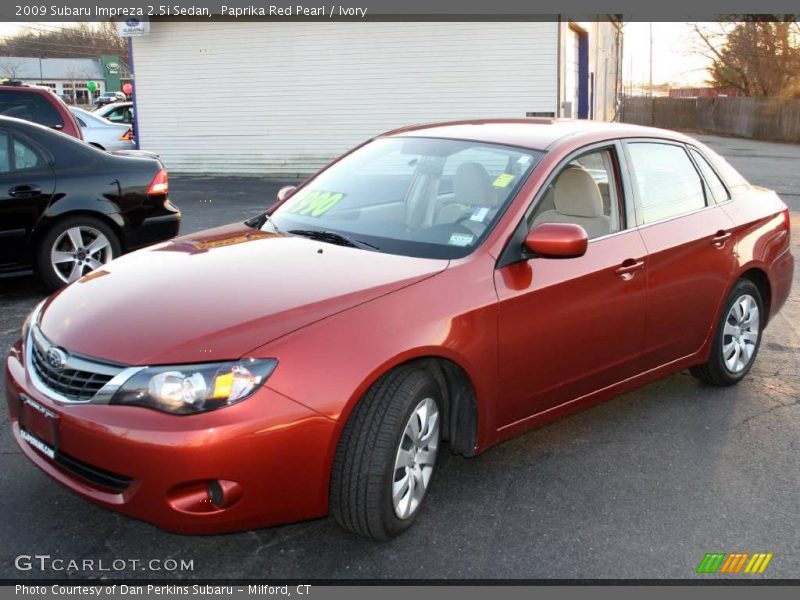 Paprika Red Pearl / Ivory 2009 Subaru Impreza 2.5i Sedan