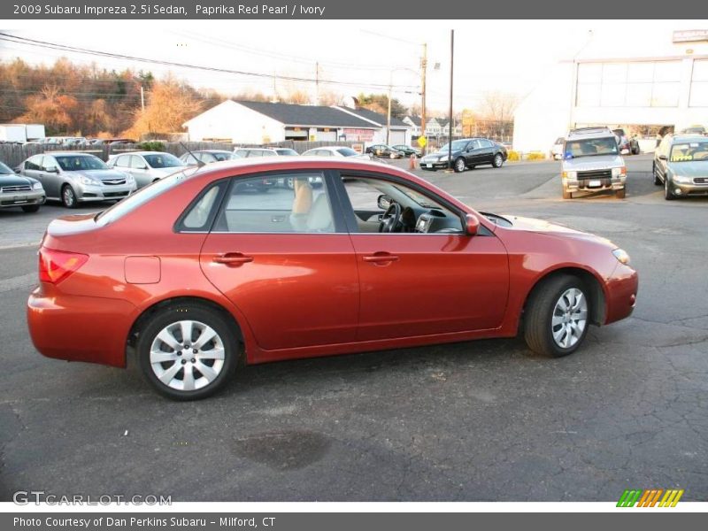 Paprika Red Pearl / Ivory 2009 Subaru Impreza 2.5i Sedan