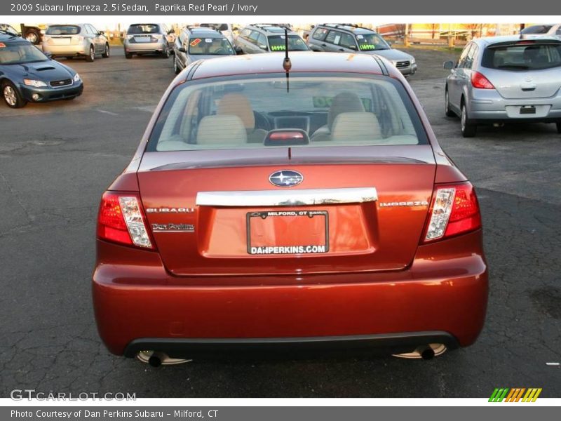 Paprika Red Pearl / Ivory 2009 Subaru Impreza 2.5i Sedan