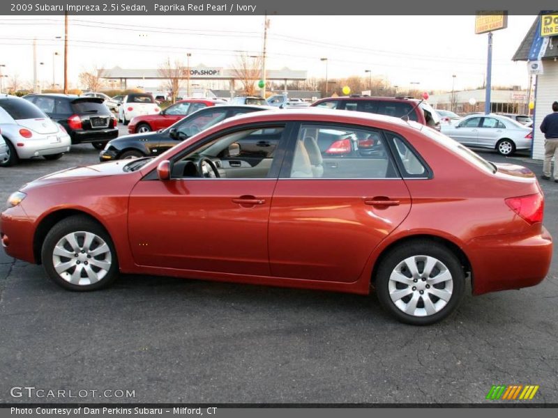Paprika Red Pearl / Ivory 2009 Subaru Impreza 2.5i Sedan
