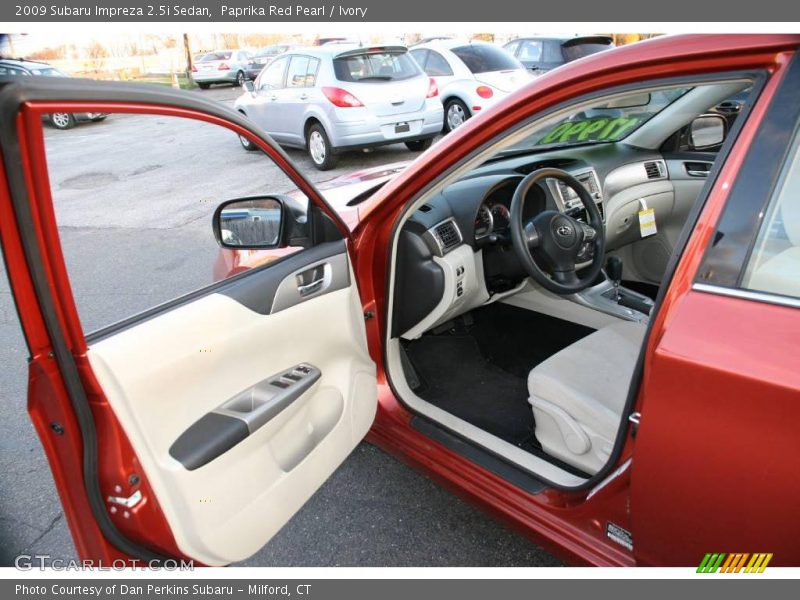 Paprika Red Pearl / Ivory 2009 Subaru Impreza 2.5i Sedan