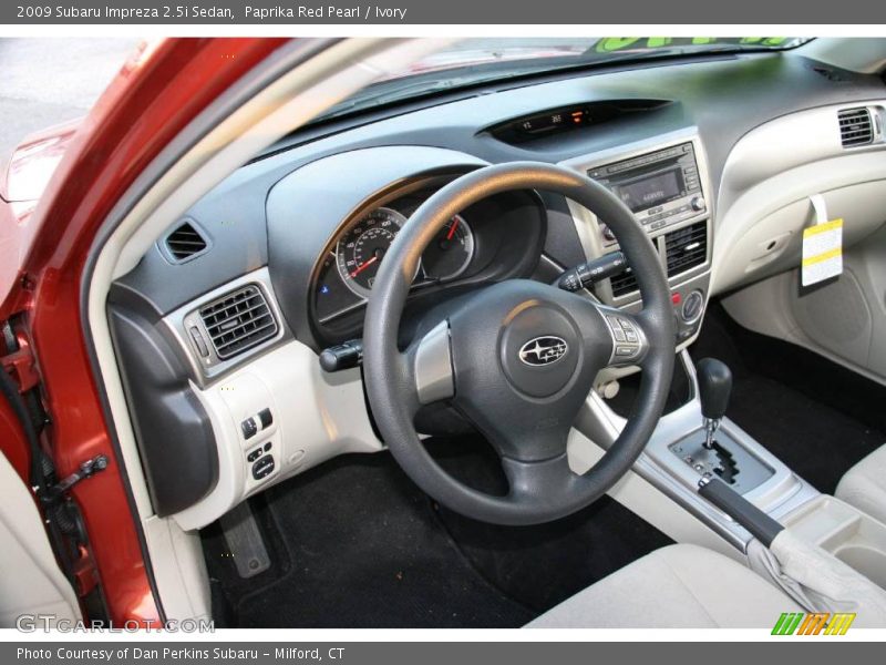 Paprika Red Pearl / Ivory 2009 Subaru Impreza 2.5i Sedan
