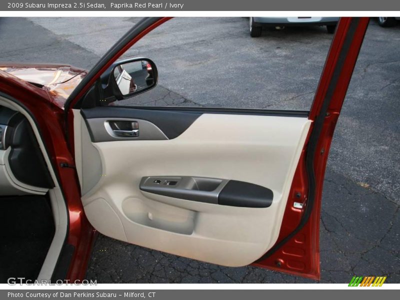 Paprika Red Pearl / Ivory 2009 Subaru Impreza 2.5i Sedan