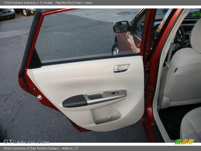 Paprika Red Pearl / Ivory 2009 Subaru Impreza 2.5i Sedan