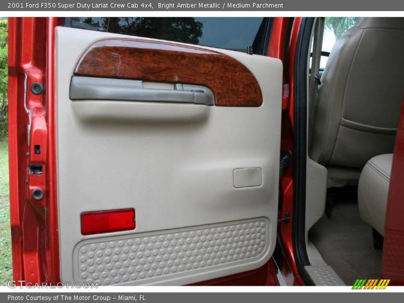 Bright Amber Metallic / Medium Parchment 2001 Ford F350 Super Duty Lariat Crew Cab 4x4