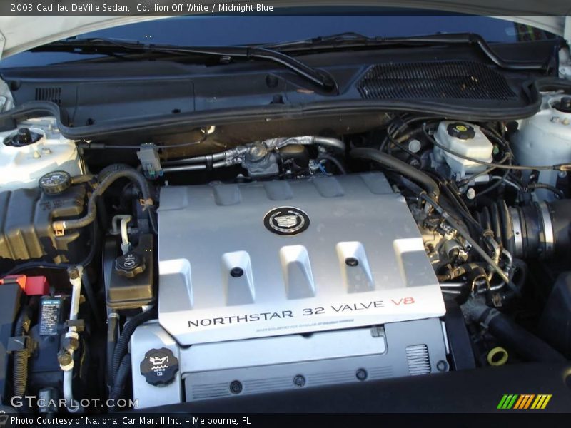 Cotillion Off White / Midnight Blue 2003 Cadillac DeVille Sedan