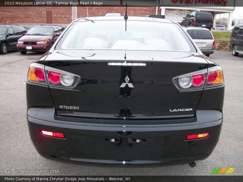 Tarmac Black Pearl / Beige 2010 Mitsubishi Lancer DE