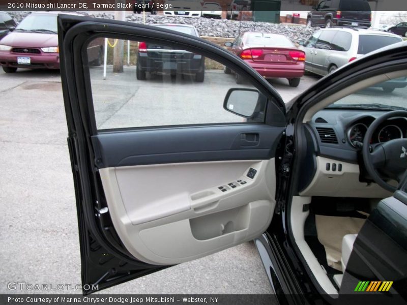 Tarmac Black Pearl / Beige 2010 Mitsubishi Lancer DE