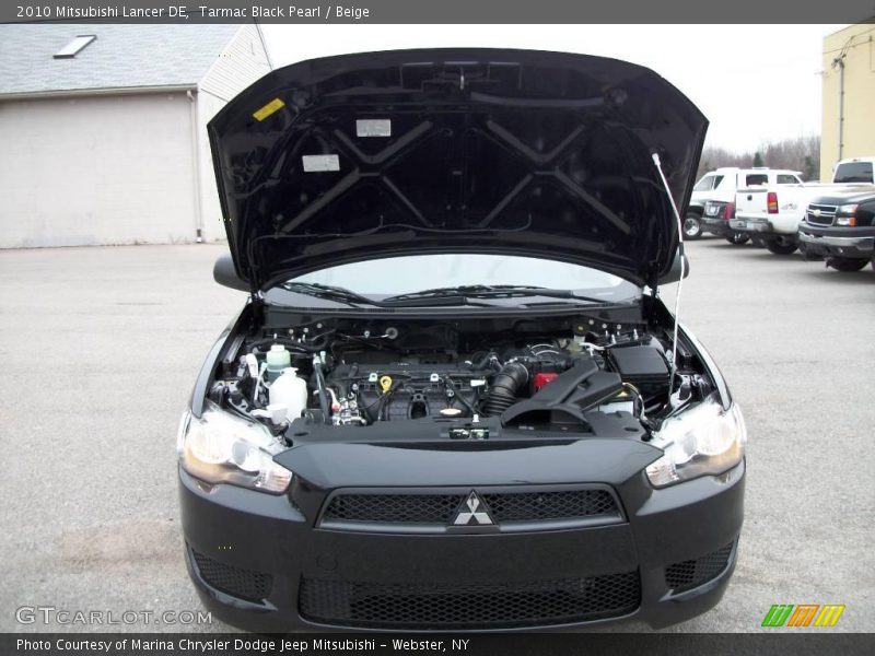 Tarmac Black Pearl / Beige 2010 Mitsubishi Lancer DE