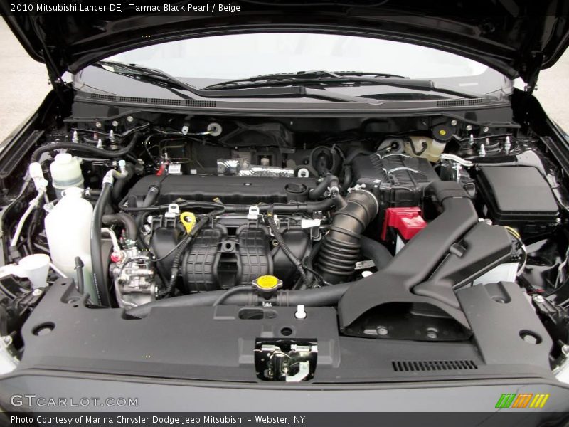 Tarmac Black Pearl / Beige 2010 Mitsubishi Lancer DE