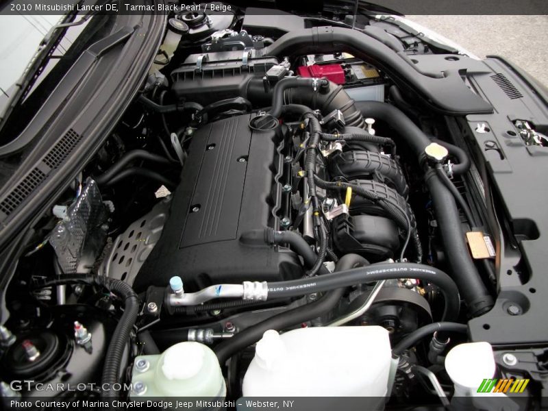 Tarmac Black Pearl / Beige 2010 Mitsubishi Lancer DE