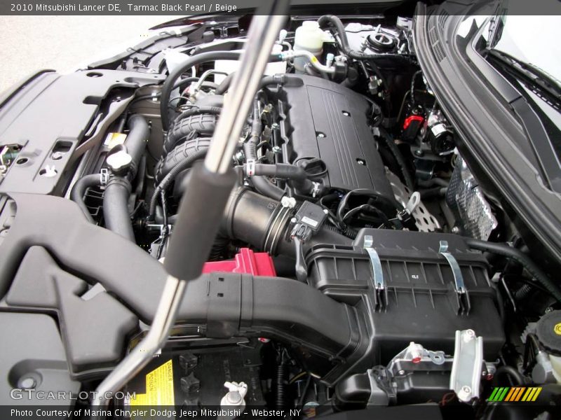 Tarmac Black Pearl / Beige 2010 Mitsubishi Lancer DE