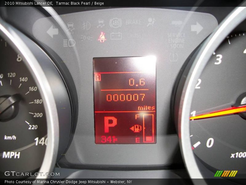 Tarmac Black Pearl / Beige 2010 Mitsubishi Lancer DE