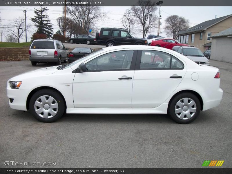 Wicked White Metallic / Beige 2010 Mitsubishi Lancer DE