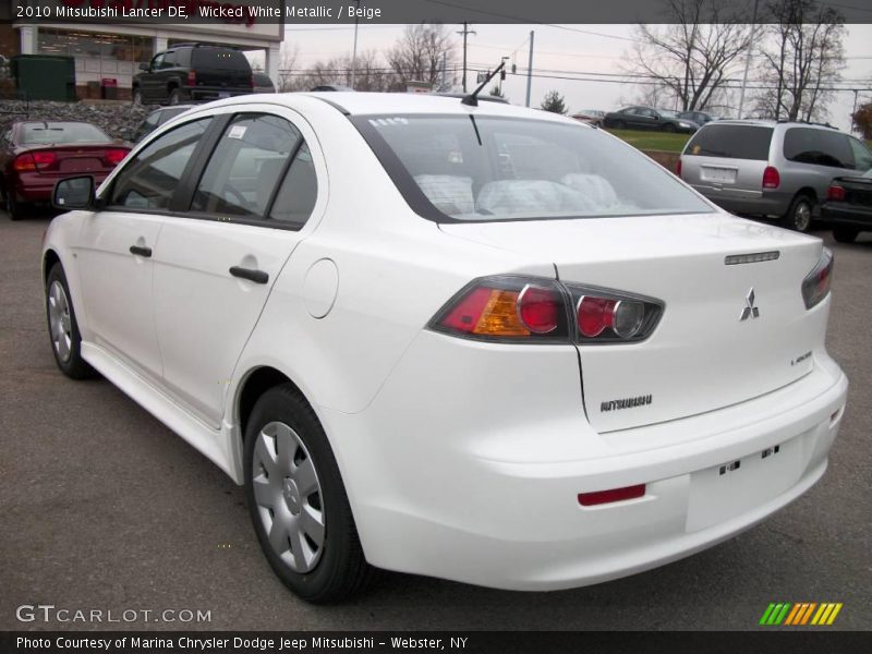 Wicked White Metallic / Beige 2010 Mitsubishi Lancer DE