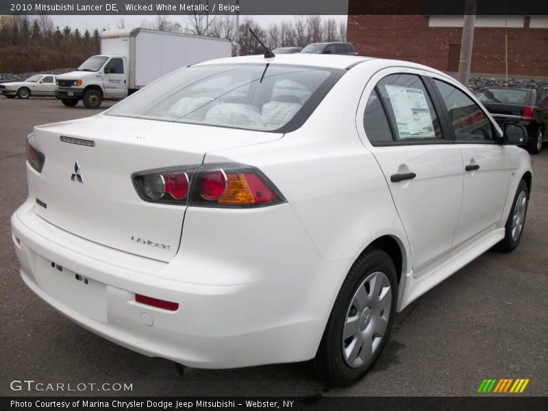 Wicked White Metallic / Beige 2010 Mitsubishi Lancer DE