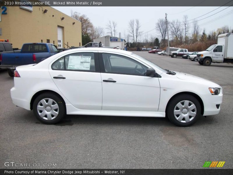 Wicked White Metallic / Beige 2010 Mitsubishi Lancer DE