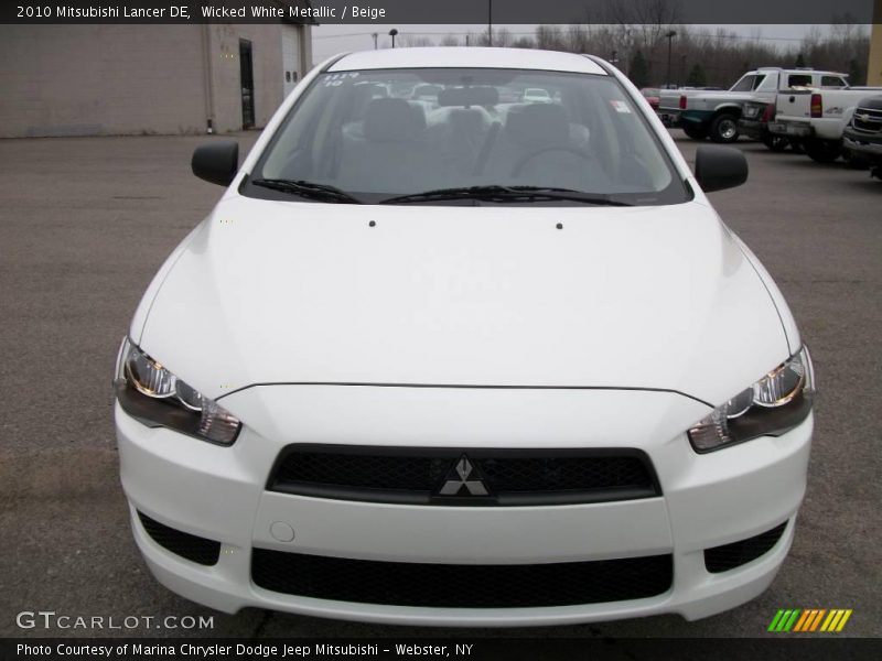 Wicked White Metallic / Beige 2010 Mitsubishi Lancer DE