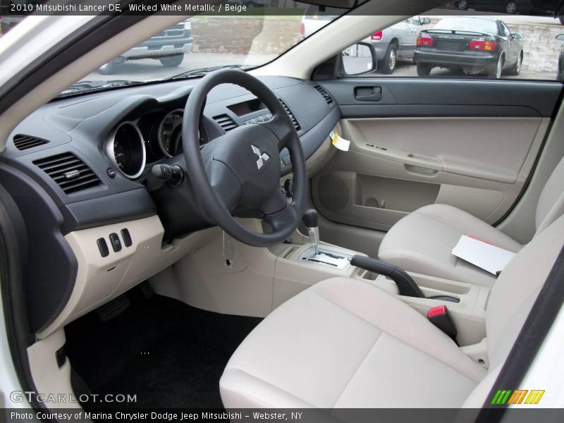 Wicked White Metallic / Beige 2010 Mitsubishi Lancer DE