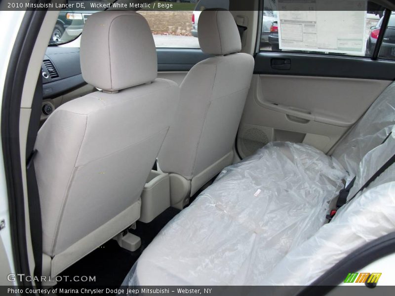 Wicked White Metallic / Beige 2010 Mitsubishi Lancer DE