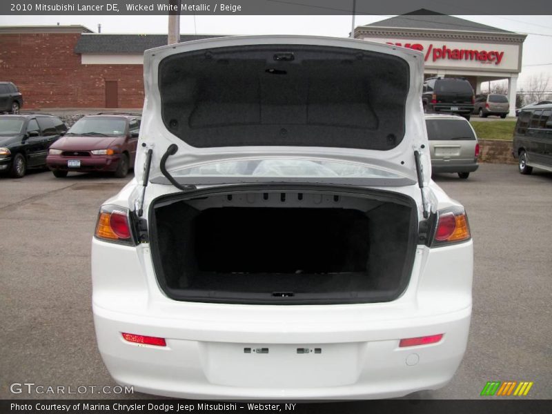 Wicked White Metallic / Beige 2010 Mitsubishi Lancer DE