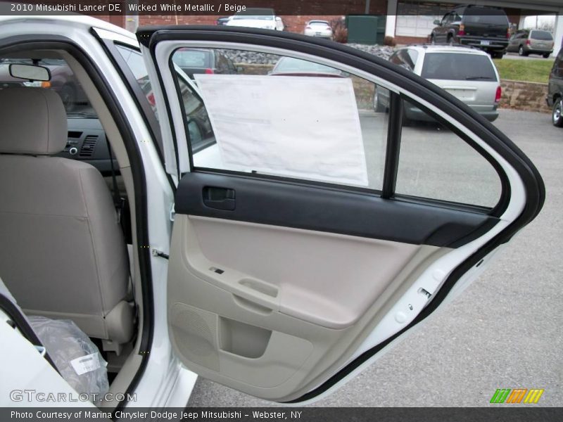 Wicked White Metallic / Beige 2010 Mitsubishi Lancer DE