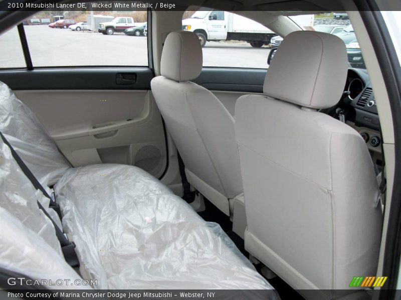 Wicked White Metallic / Beige 2010 Mitsubishi Lancer DE
