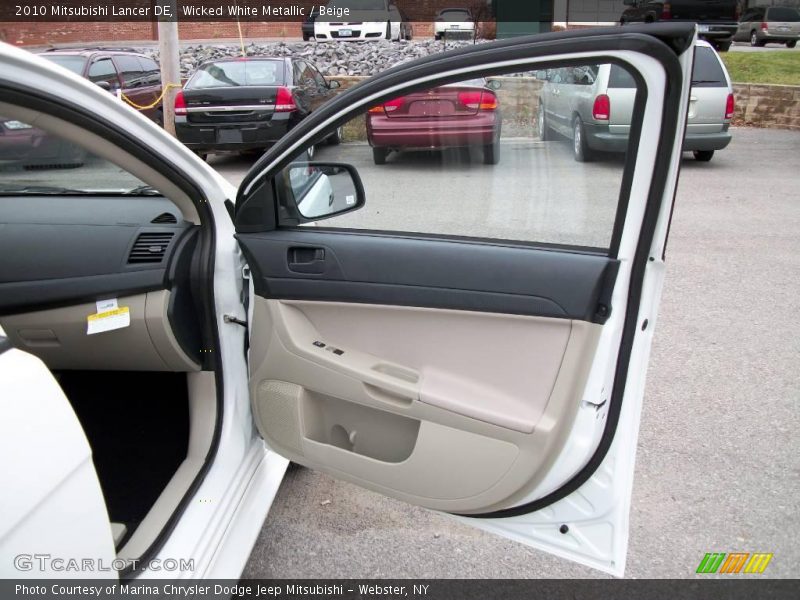Wicked White Metallic / Beige 2010 Mitsubishi Lancer DE