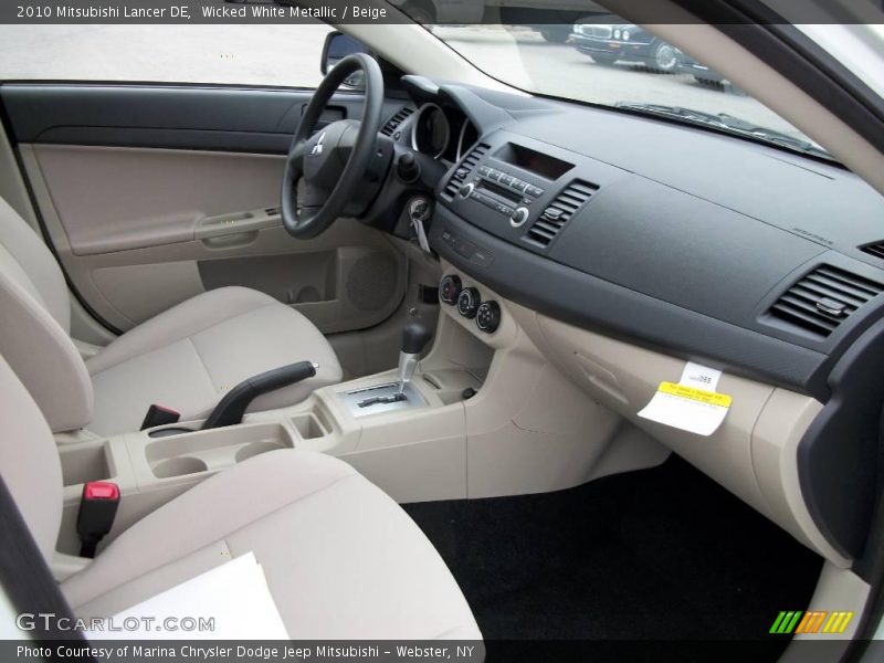 Wicked White Metallic / Beige 2010 Mitsubishi Lancer DE
