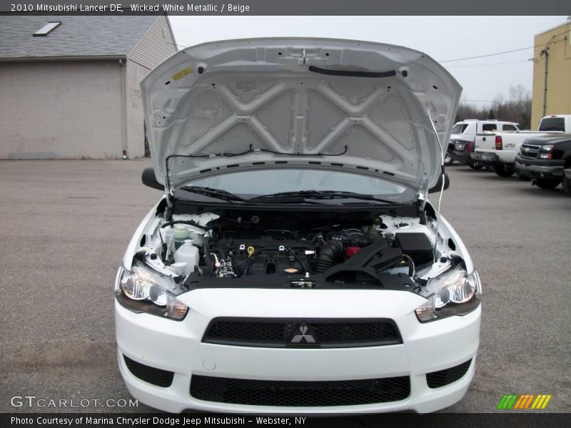 Wicked White Metallic / Beige 2010 Mitsubishi Lancer DE